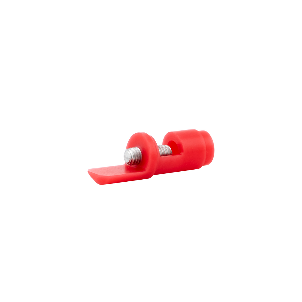 Red plastic tool with a metal component on a white background