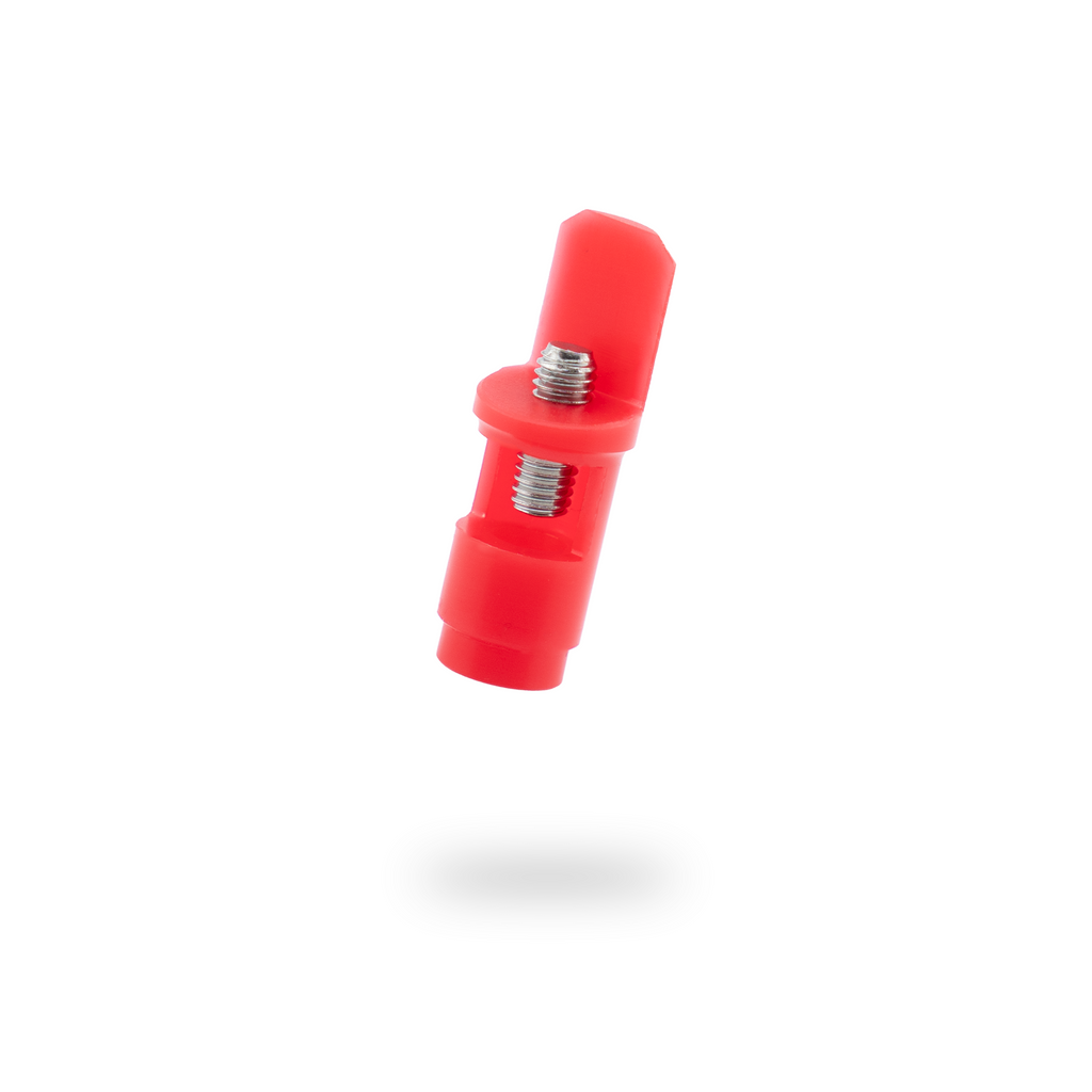 Red plastic connector with metal screws on a white background