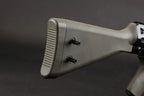 Close-up of a rifle stock with a textured rear butt pad and two black adjustment screws, shown against a dark gray background.