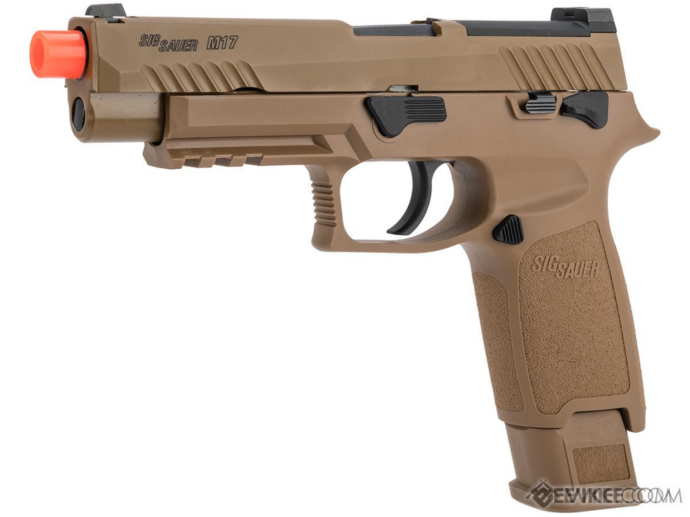 Tan-colored airsoft gun with red tip on a white background