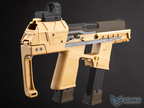 A tactical submachine gun airsoft replica in sand tan and black, featuring a FLUX grip, a mounted RA26SP optic, and dual magazines, shown against a dark gray gradient background.