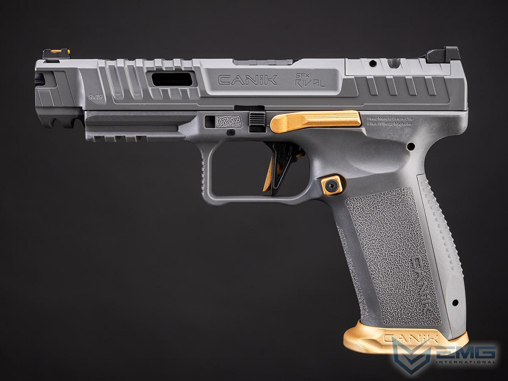Gray handgun with gold accents on a black background