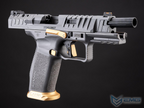 Black and gold handgun on a black background with 'EMG' branding.