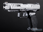 Gray handgun with 'Canik' branding on a black background