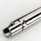 Close-up of a metallic barrel on a white background