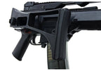 Close-up of a black tactical firearm accessory or stock assembly attached to a rifle, shown against a plain white background.