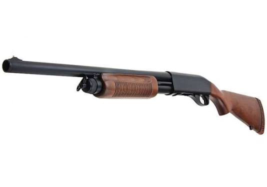 A pump-action shotgun with a black metal barrel and receiver, and brown wood-grain stock and foregrip, shown against a plain white background.