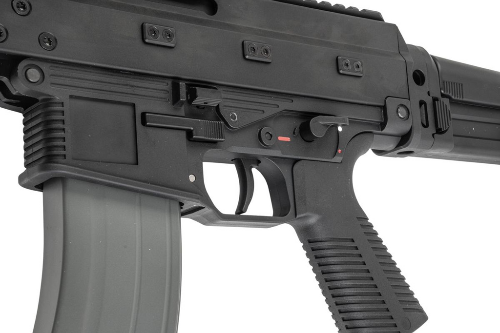 Maruyama/VFC ISO556 airsoft rifle left receiver close-up showing selector, trigger, ribbed grip and magazine.