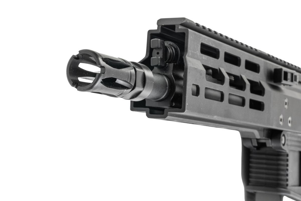 Maruyama/VFC ISO556 airsoft rifle muzzle close-up showing slotted flash hider, vented handguard and top rail.
