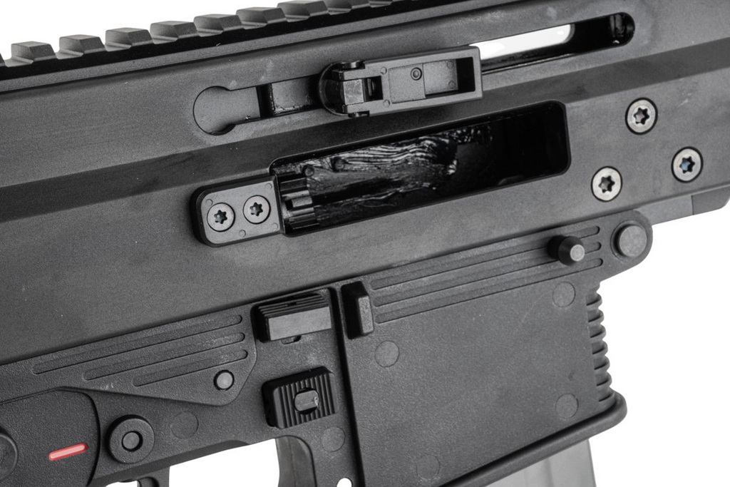 Maruyama/VFC ISO556 airsoft rifle right receiver close-up showing open ejection port, charging handle and controls.