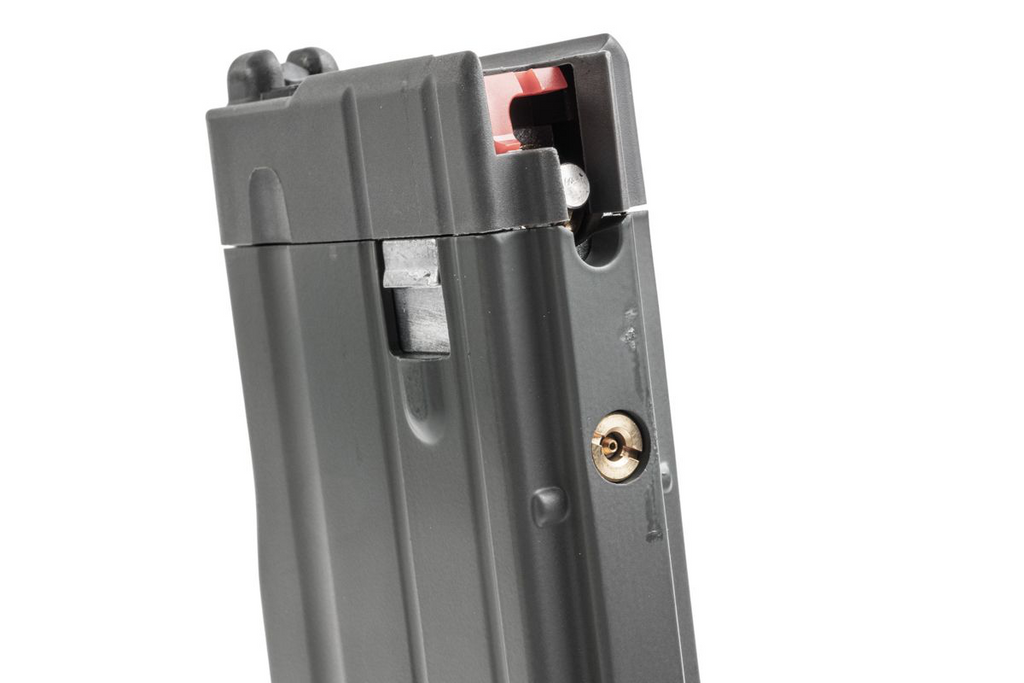 Maruyama/VFC ISO556 grey gas magazine close-up showing feed lips, red component and brass valve.