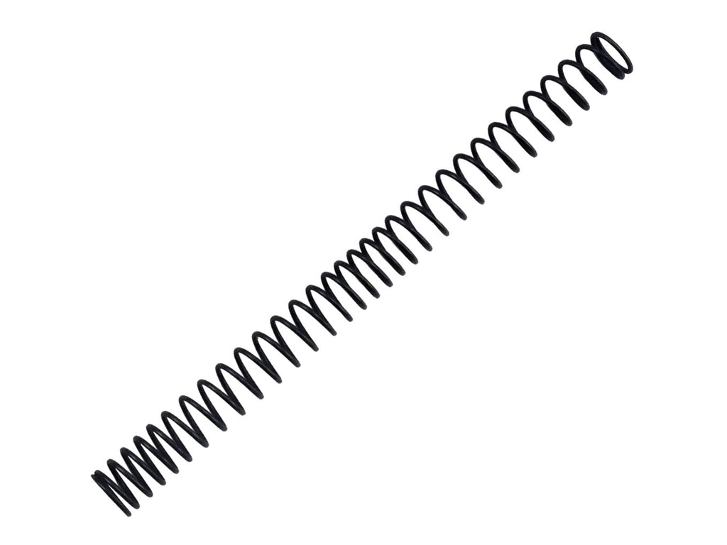 Coiled black spring on a white background
