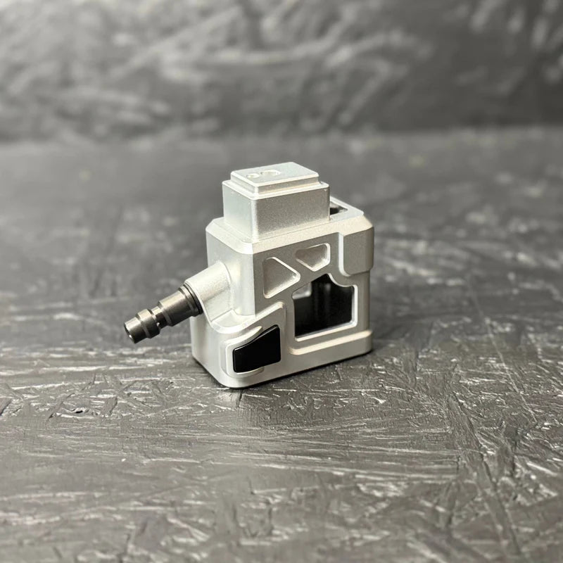 Small mechanical component on a textured gray surface