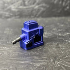 Blue mechanical component on a textured gray surface