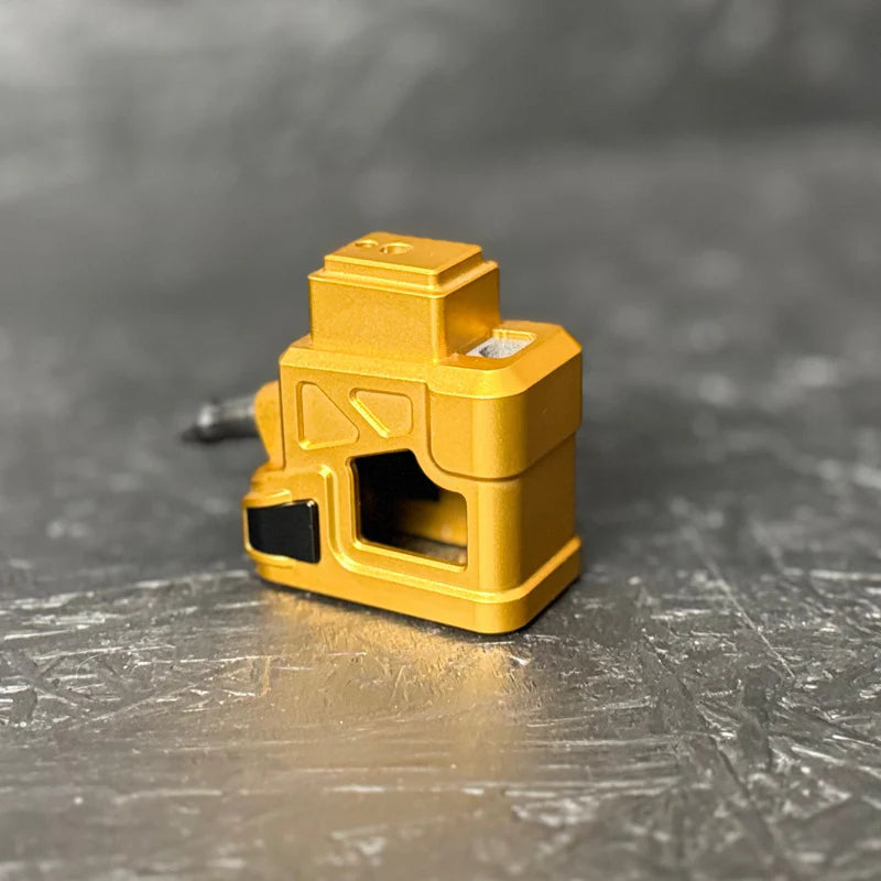 Yellow tool on a metallic surface with a blurred background