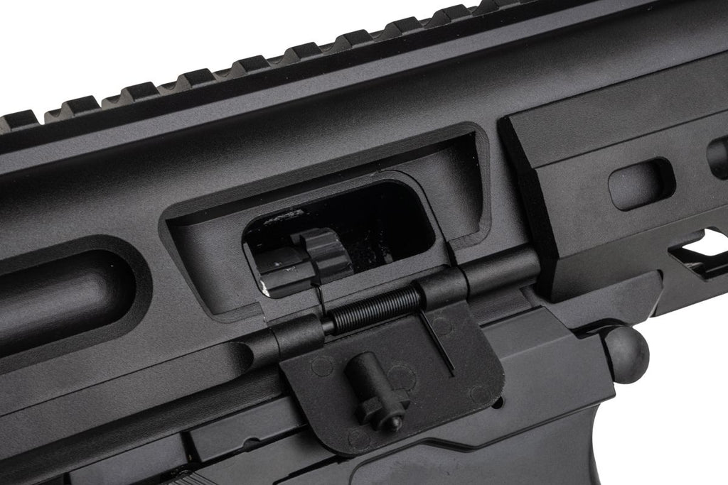 Golden Eagle MPX-K airsoft receiver close-up showing open ejection port and lowered dust cover.