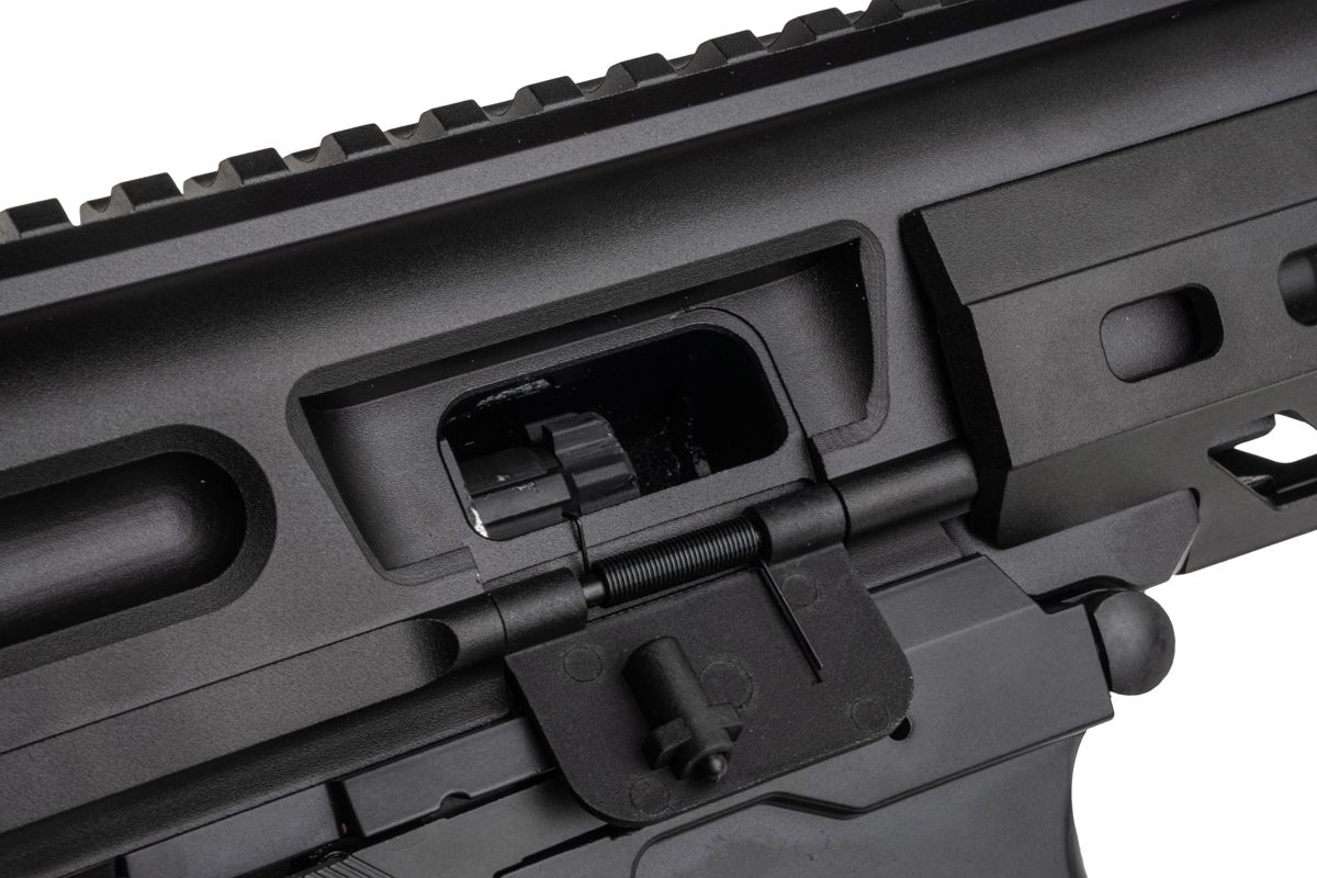 Golden Eagle MPX-K airsoft receiver close-up showing open ejection port and lowered dust cover.