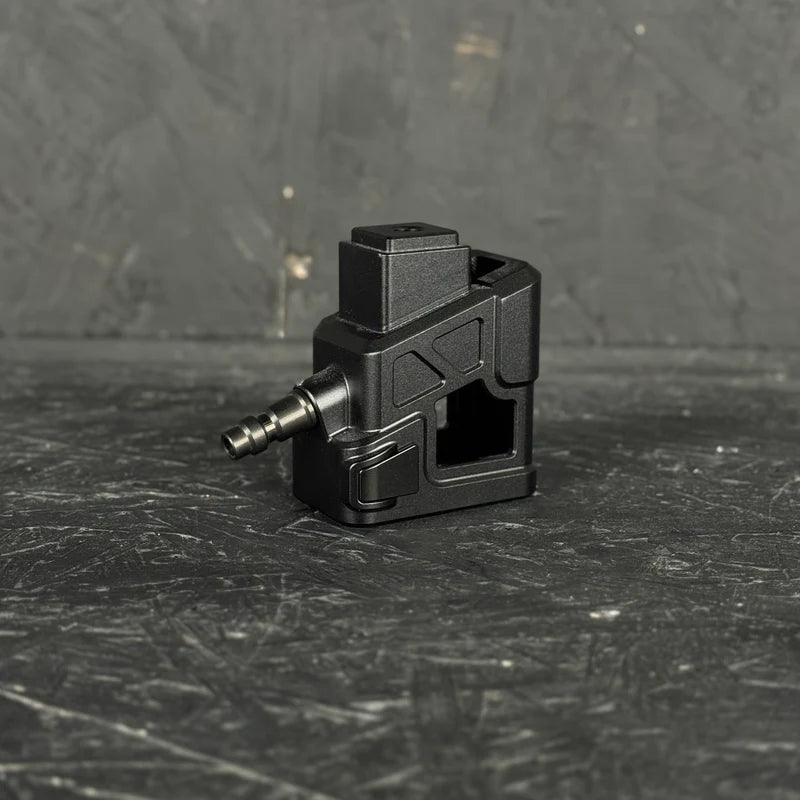 Black mechanical component on a textured black surface