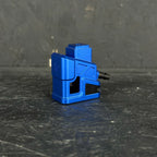 Blue mechanical component on a dark textured surface
