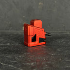 Red hpa adapter on a grey background