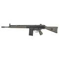 A tactical rifle with a black metal receiver and barrel, a textured olive green handguard and magazine, and an olive green stock, shown against a plain white background.