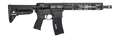 A black tactical rifle with a vertical foregrip, adjustable stock, and a black magazine, shown against a plain white background.