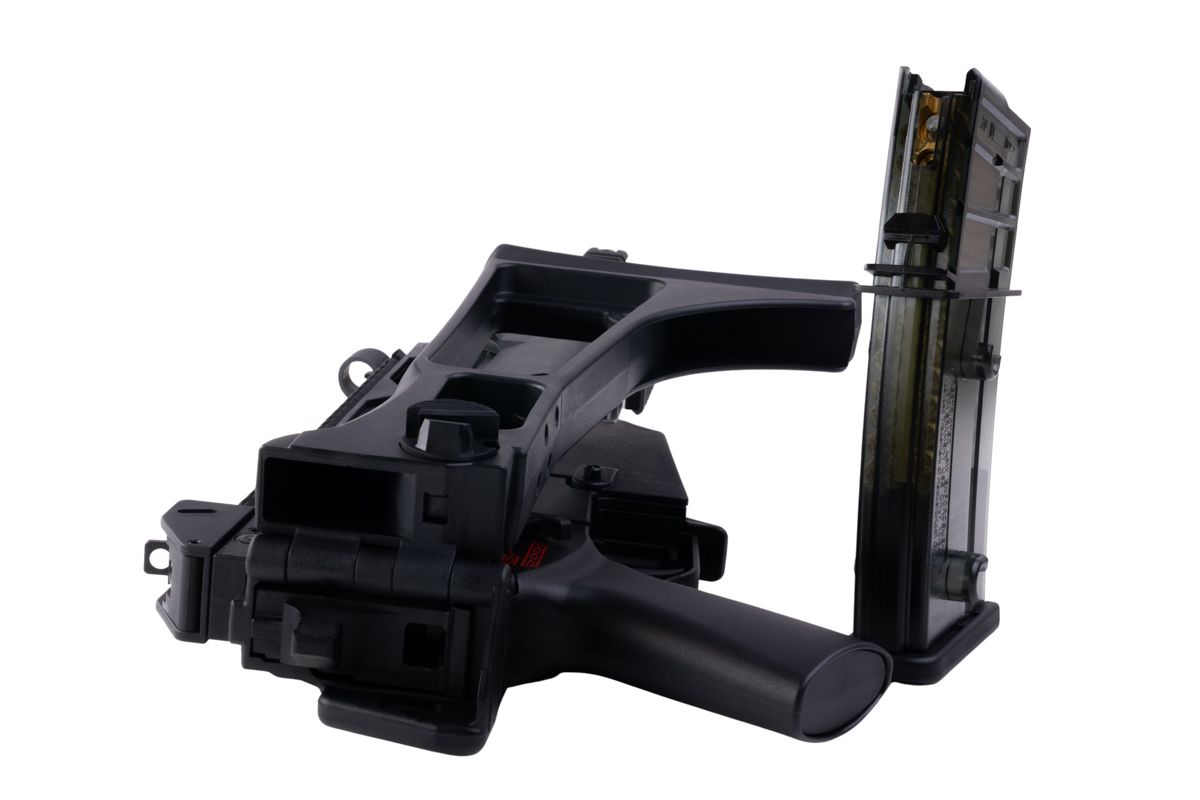 VFC G36KV airsoft rifle folded stock rear view with detached transparent gas magazine standing alongside.