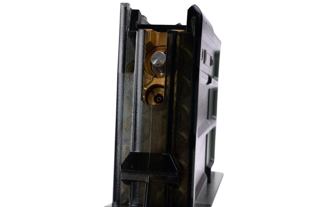 VFC G36KV transparent airsoft gas magazine rear close-up showing brass valve housing and silver release valve.