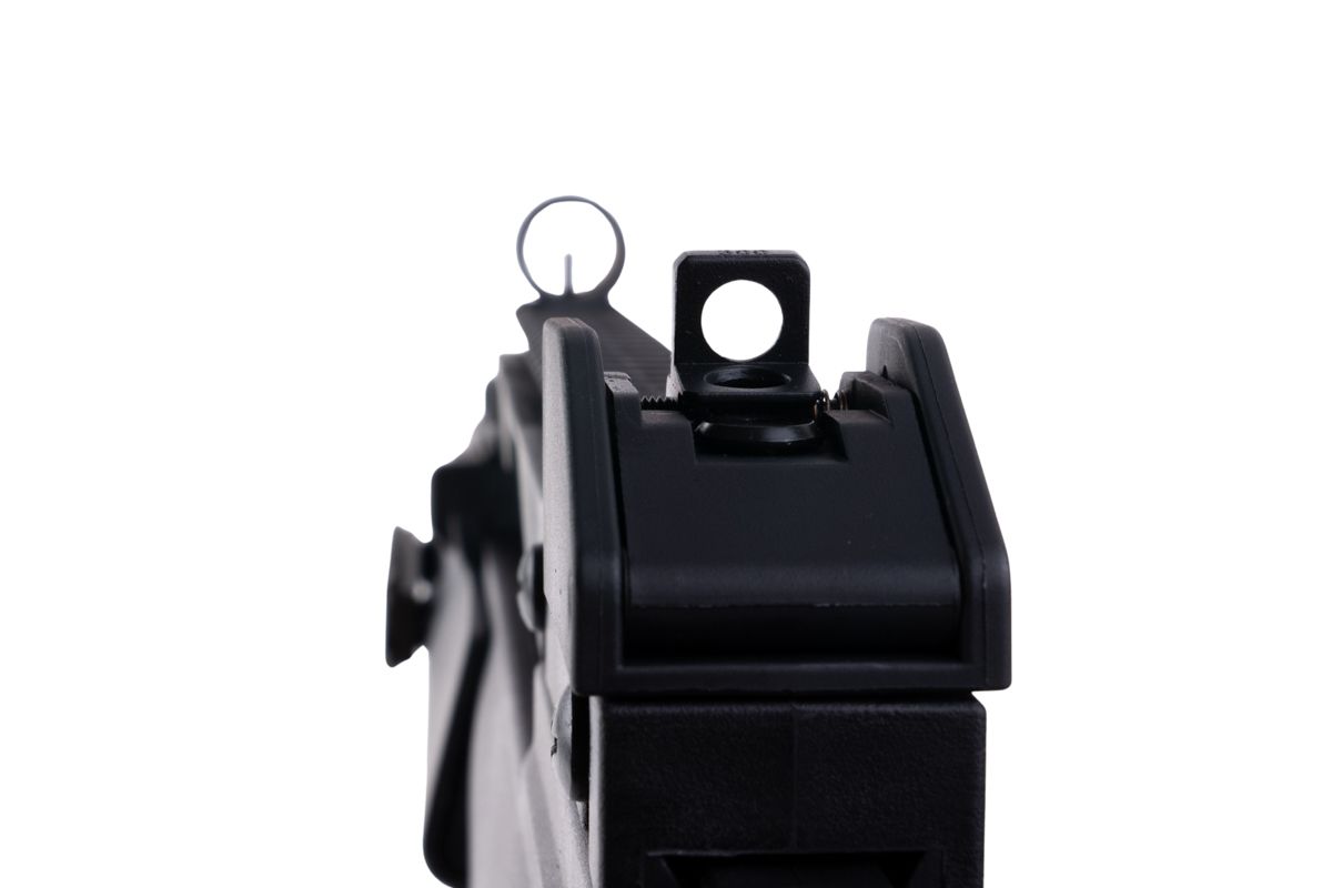 VFC G36KV airsoft rifle view along carry handle showing rear aperture sight and hooded front sight.