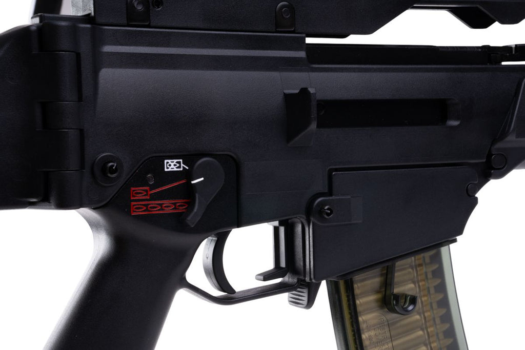 VFC G36KV airsoft rifle right receiver close-up showing selector markings, trigger and magazine release.