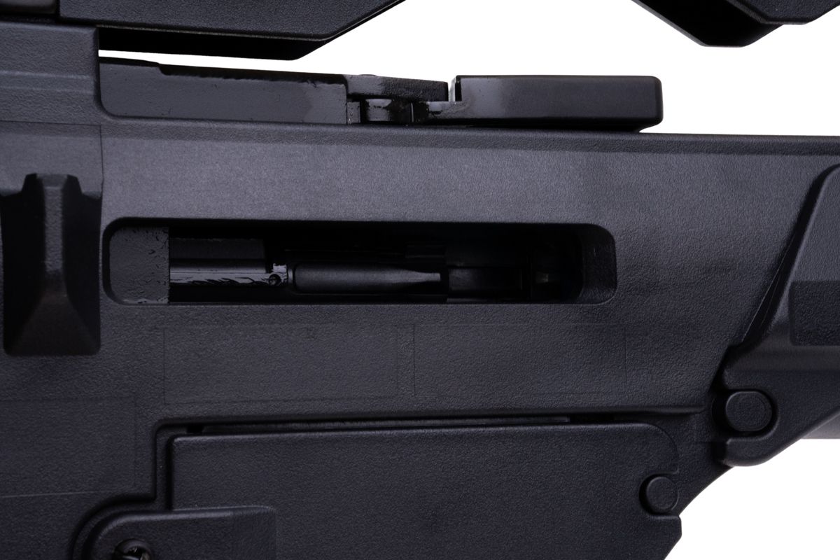 VFC G36KV airsoft rifle ejection port close-up showing internal bolt and charging handle above.