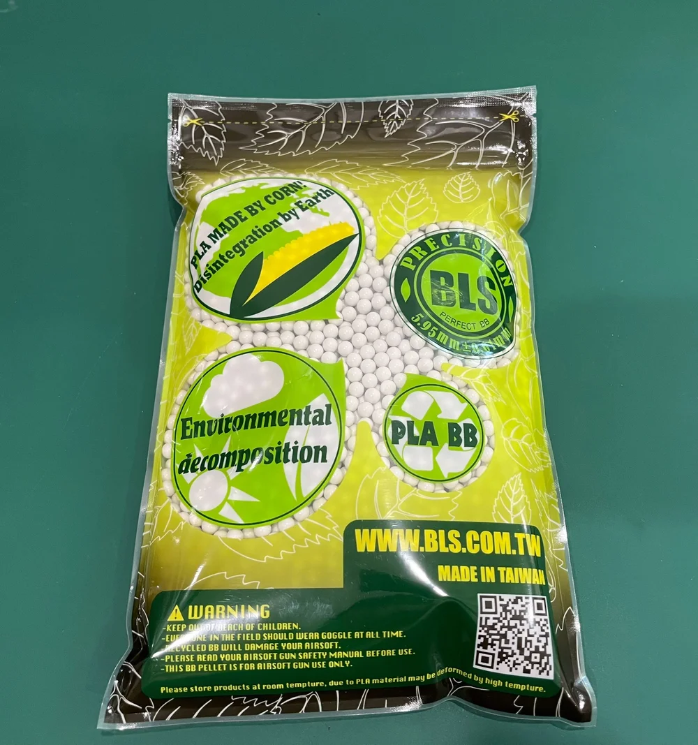 Packaged product with green and yellow design on a teal background