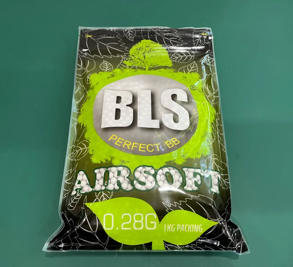 BLS airsoft BB packaging on a green background