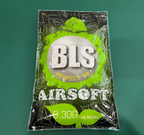 Packaging of BLS airsoft BBs on a green background