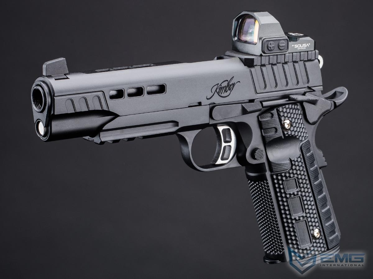 Black handgun with rail and optics on a dark background