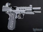 Black handgun with visible branding on a dark background