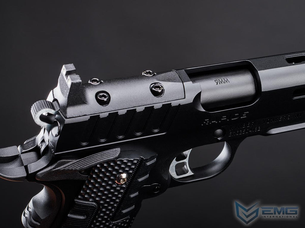 Close-up of a black revolver with visible branding on a dark background