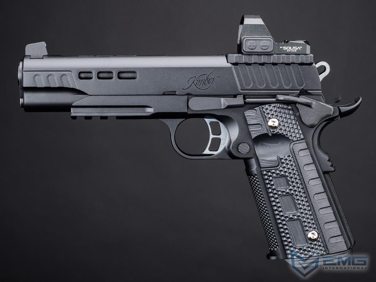 Black handgun with textured grip on a dark background