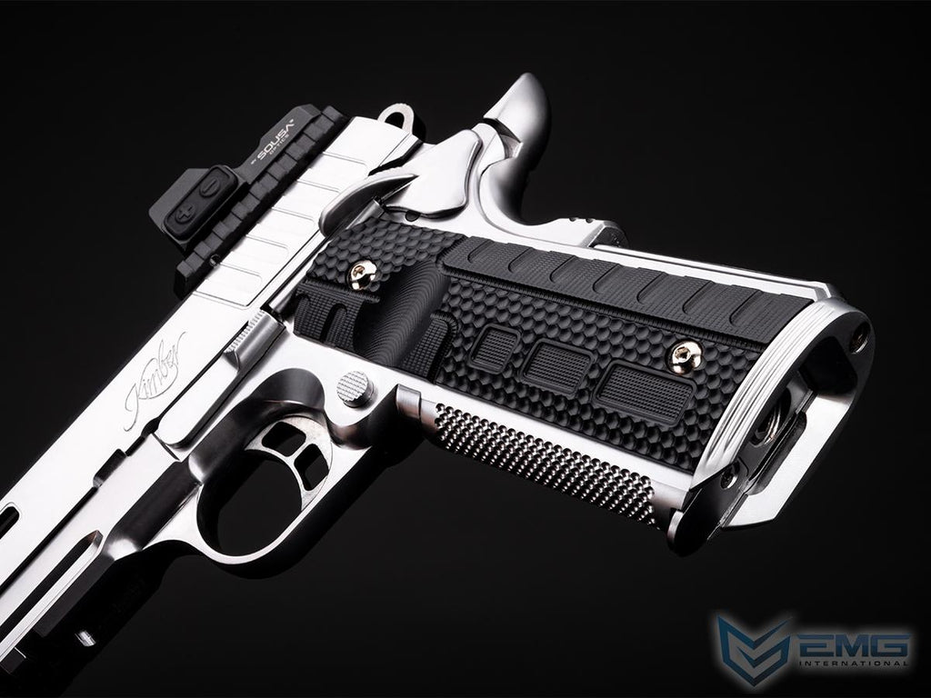 Close-up of a silver and black handgun on a black background with 'EMG' branding.