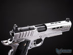 Silver handgun with 'EMG' branding on a black background
