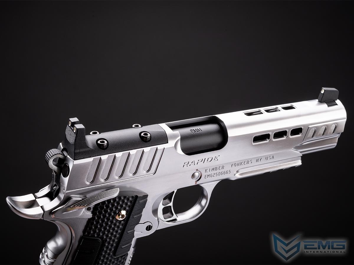 Silver handgun with 'EMG' branding on a black background