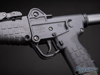 EMG x KelTec SUB2000 airsoft SMG left receiver close-up showing KelTec markings, trigger and textured grip.