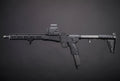 EMG x KelTec SUB2000 KWA airsoft SMG, left-side view with mounted optic, long magazine and black stock.