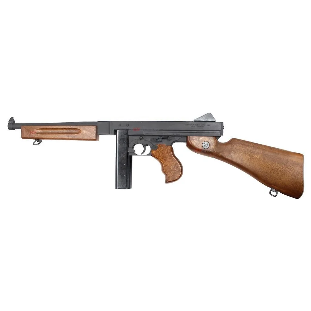 Vintage submachine gun with wooden stock on a white background