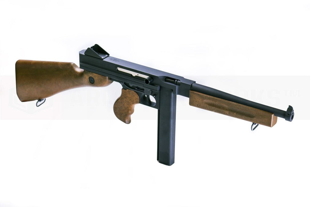 Trench gun with wooden stock and black metal parts on a white background