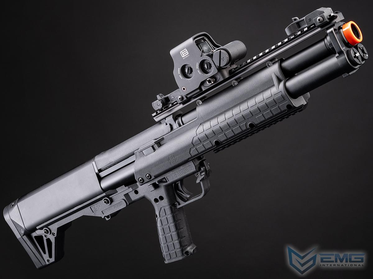 Airsoft gun with attached scope on a dark background