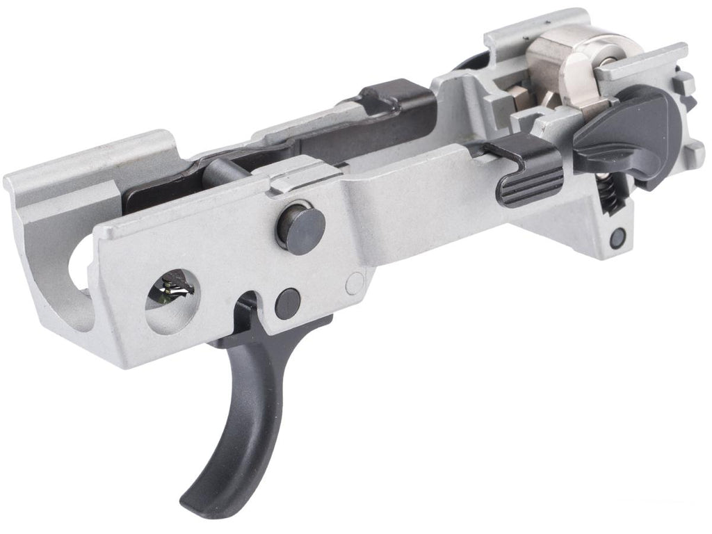 A close-up studio shot of a Sig P320 FCU with a black trigger and black adjustment knobs, isolated on a white background.