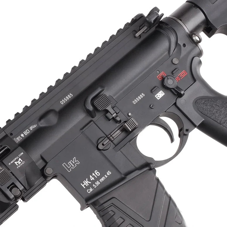 Close-up of a black HK LK 416 tactical rifle or replica firearm showing the receiver, handguard, trigger guard, magazine, and part of the pistol grip on a white background.